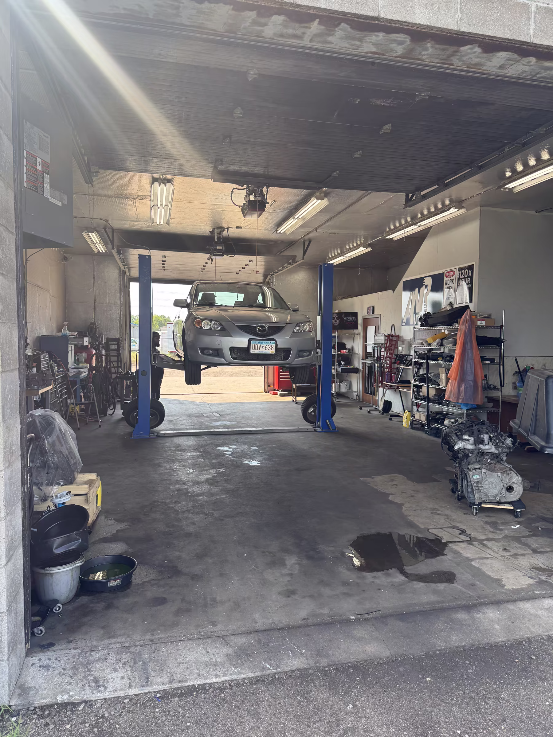 A vehicle raised in the ANR Automotive service bay